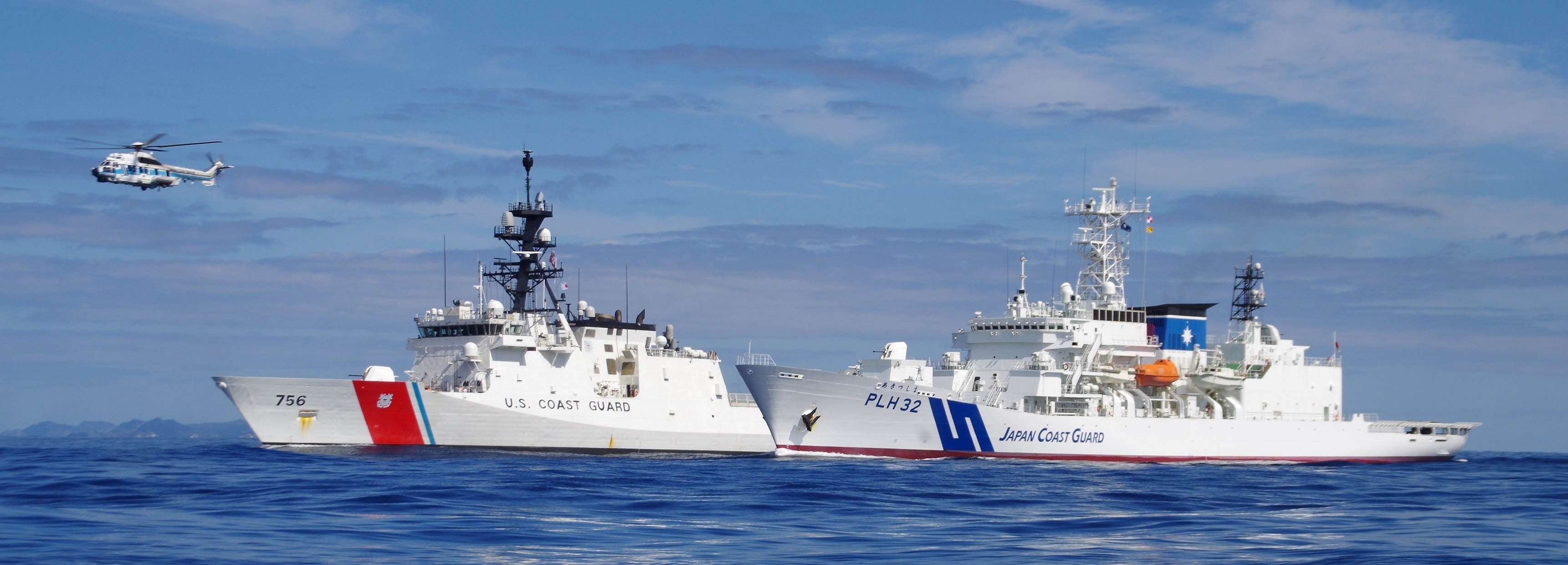 Ships from the U.S. Coast Guard and Japan Coast Guard conducted exercises near the Ogasawara Islands of Japan, Feb. 21, 2021. The U.S. Coast Guard Cutter Kimball and Japan Coast Guard Ship Akitsushima, two of the respective services’ newest and most capable vessels, operated alongside helicopters and unmanned aerial vehicles to practice interdicting foreign vessels operating illegally inside Japanese waters. (U.S. Coast Guard photo courtesy of the Coast Guard Cutter Kimball)